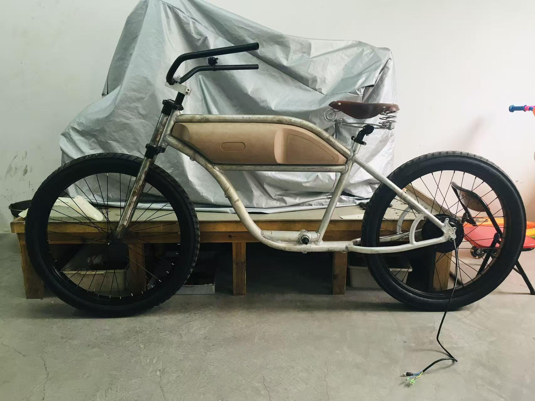 Raw Greaser prototype frame in the workshop, 2015