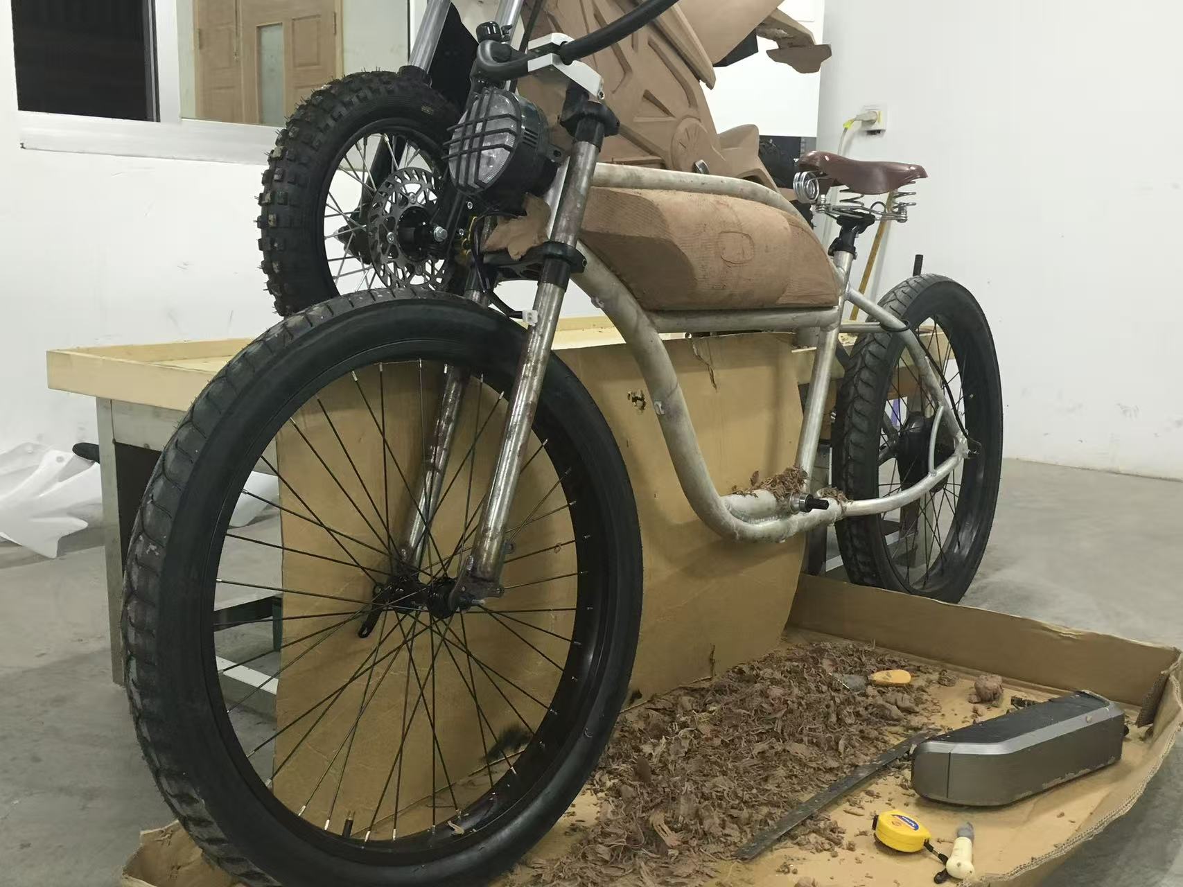 Greaser prototype with knobby front tire and clay tank mockup
